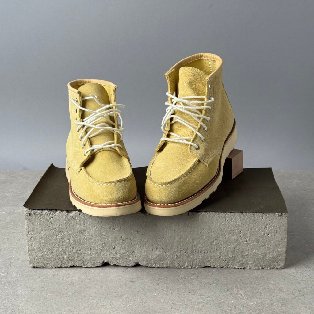 Red Wing Classic Moc boots in Hawthorne Abilene leather with white crepe sole and moc toe stitching on minimalist display